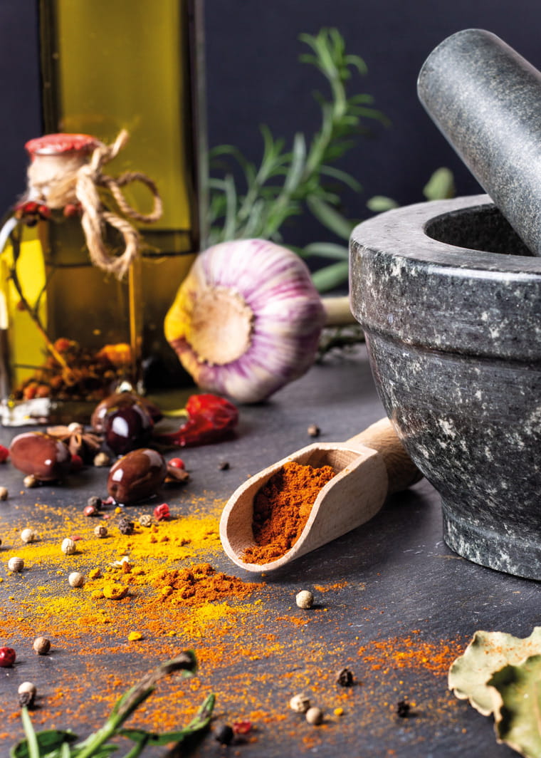 Crush salt or pepper with a knife blade or a mortar and add it into the dish at the last minute