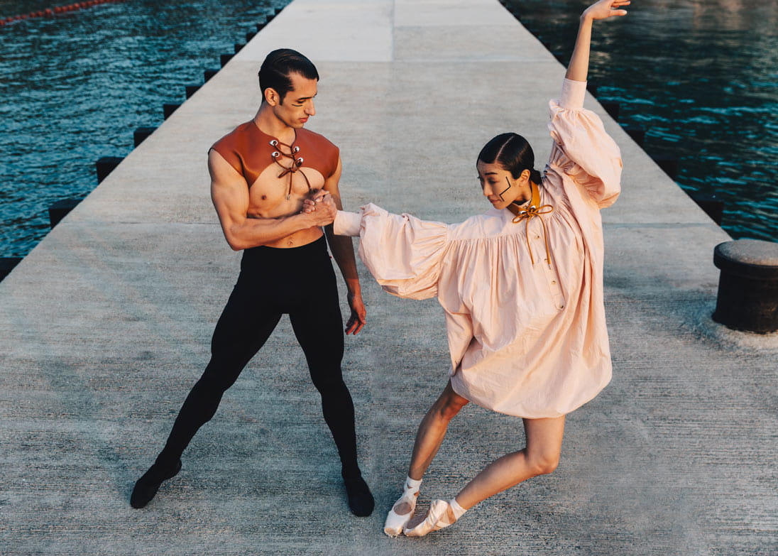 Models dance on a jetty wearing dance-inspired pieces and tops from Sportmax 