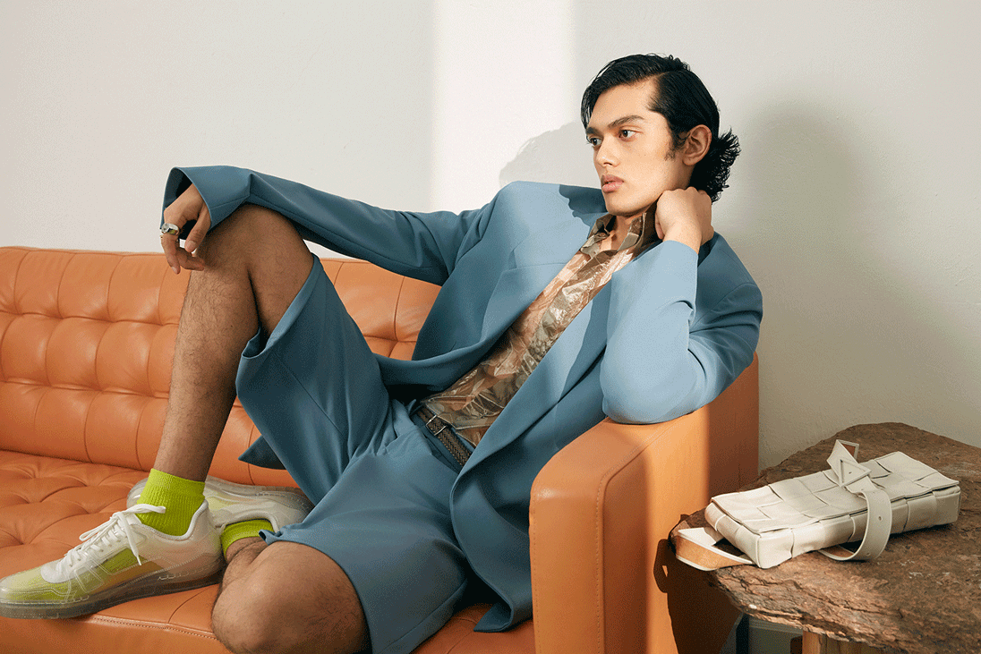 A model wears Bottega Veneta, Fendi and Hermes
