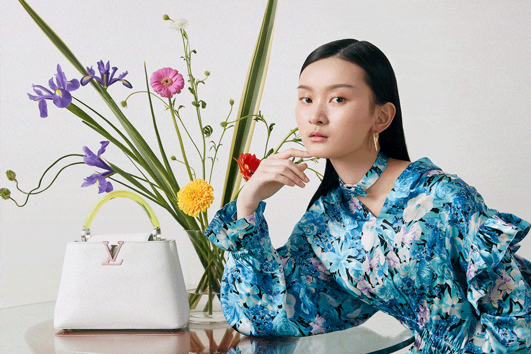 A model wears Balenciaga, CELINE and Louis Vuitton