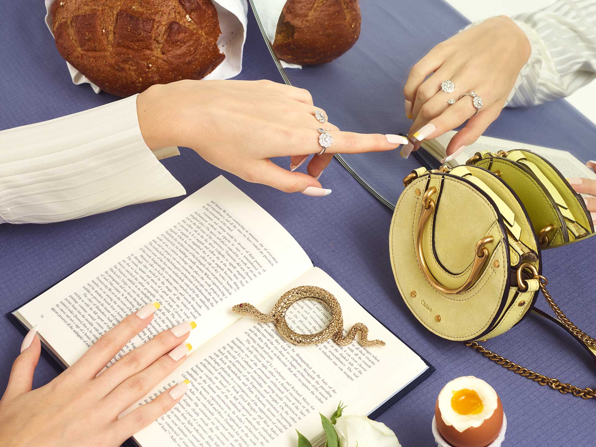 A selection of fine jewellery from Chanel is paired with French tips 2.0