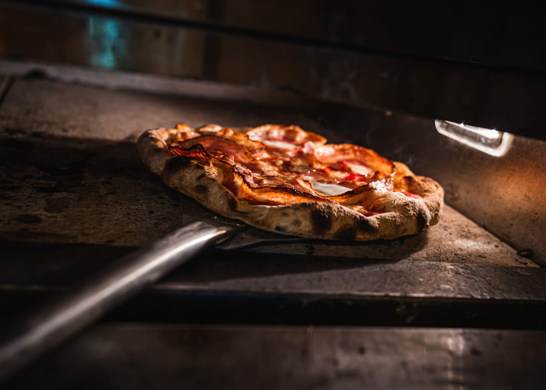 Pizza in the oven at The Pizza Project