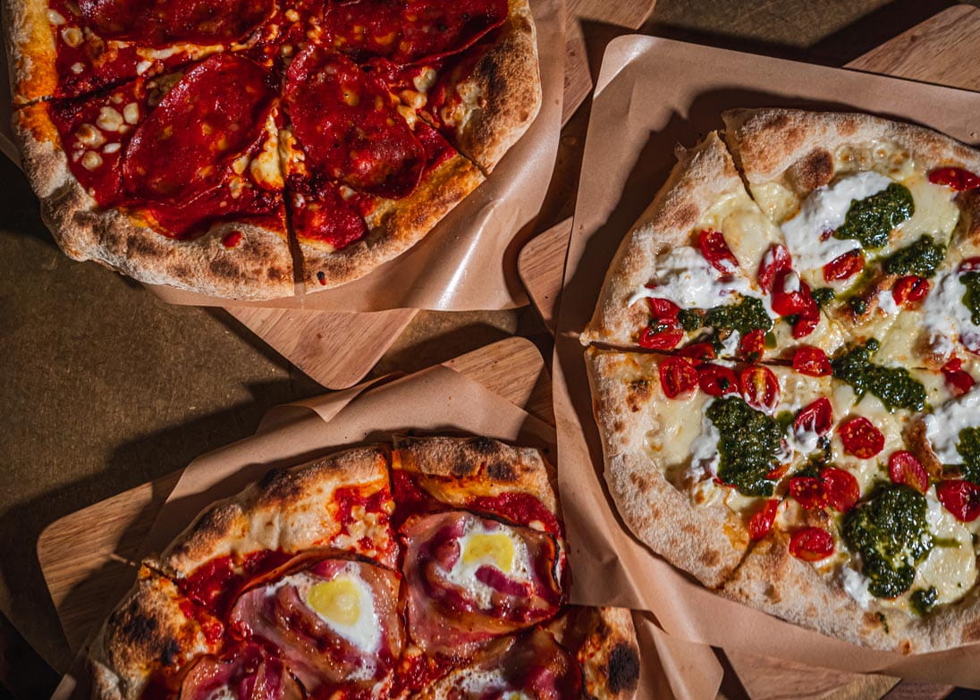 Freshly made pizza at The Pizza Project
