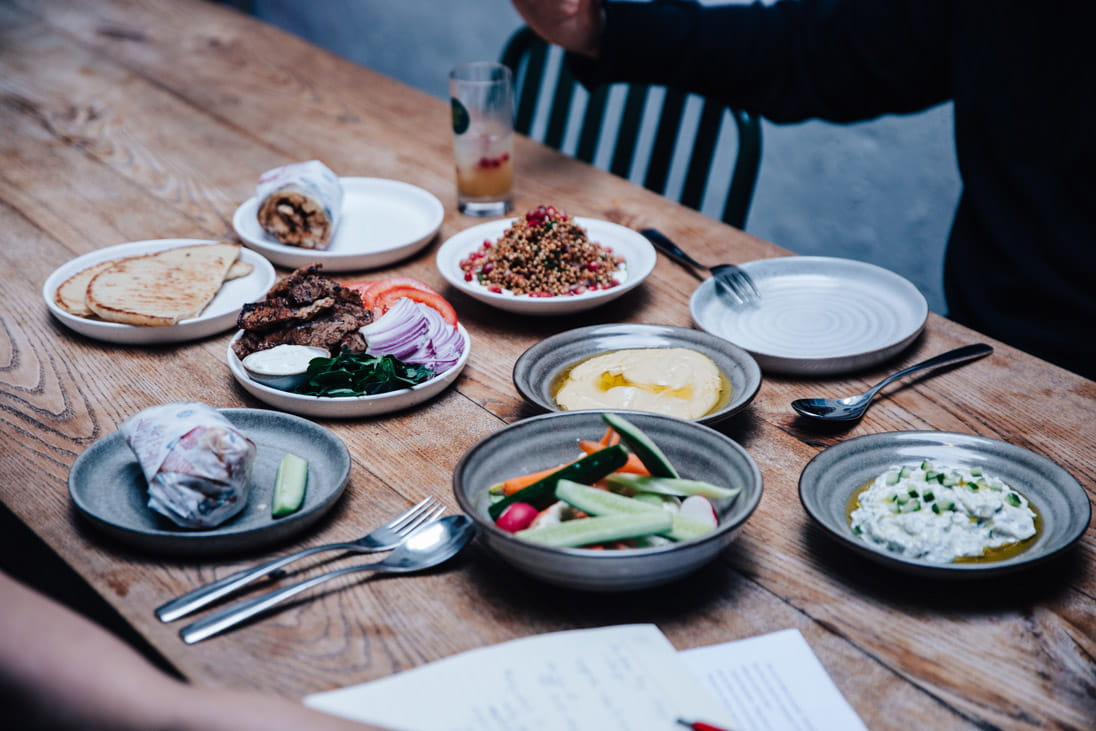 A table of food at Artemis & Apollo Hong Kong