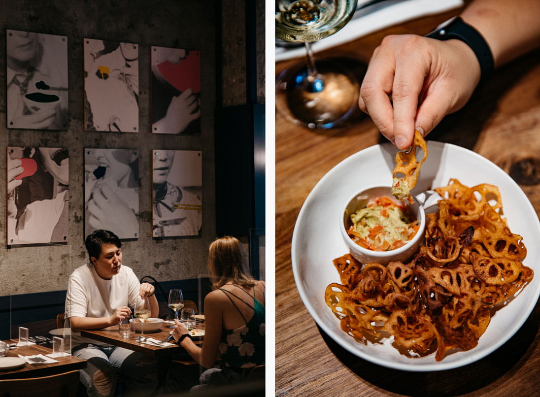Roots Eatery chef and founder Stephanie Wong converses with Camille Lisette Glass over a plate of her lotus chips