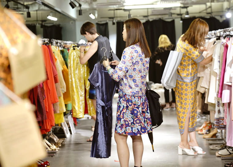People shop for pre-loved clothing