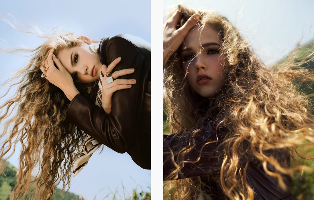 A model’s unruly hair spills over a Theory leather coat 