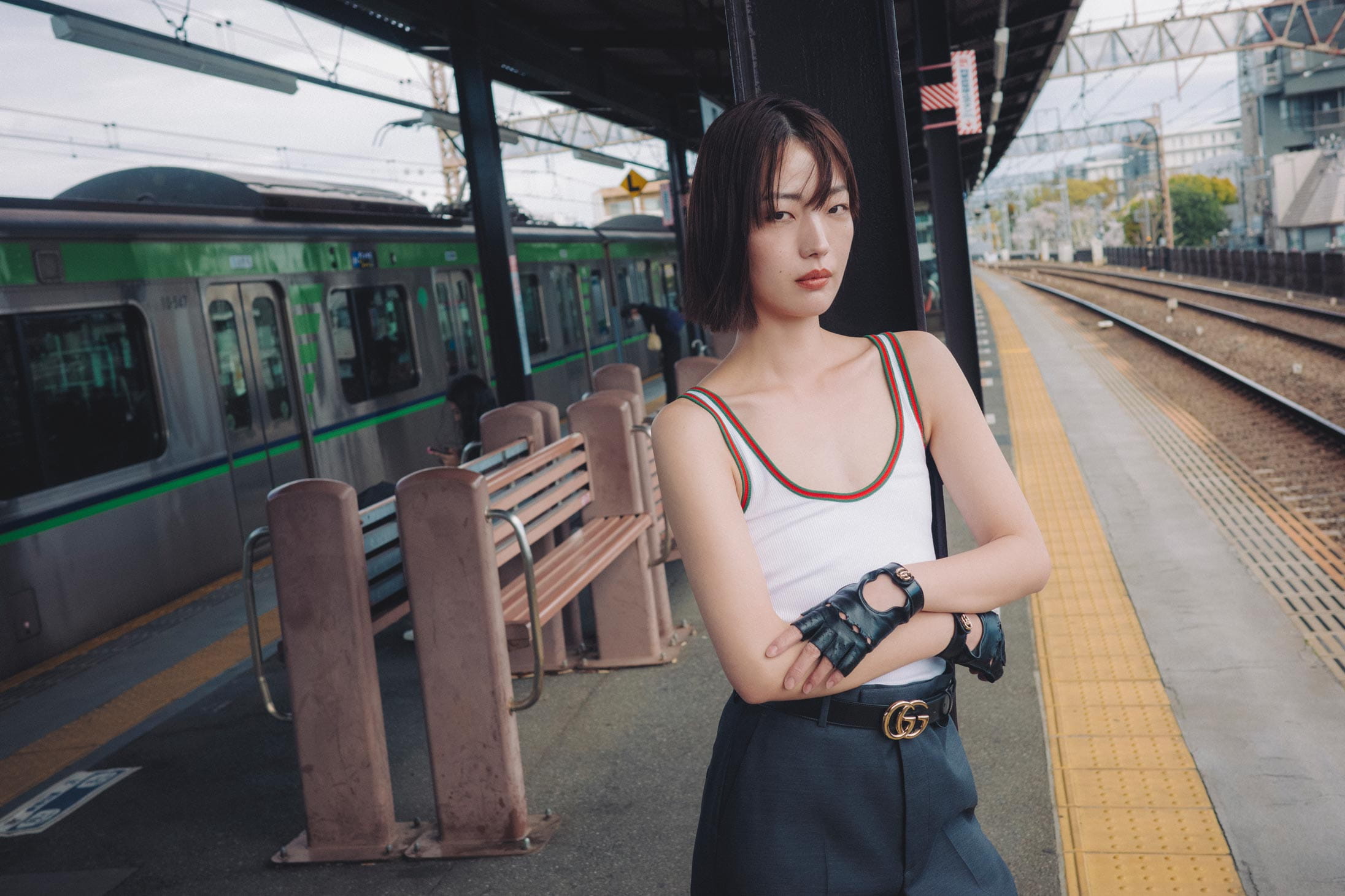 A model poses in Tokyo wearing Gucci