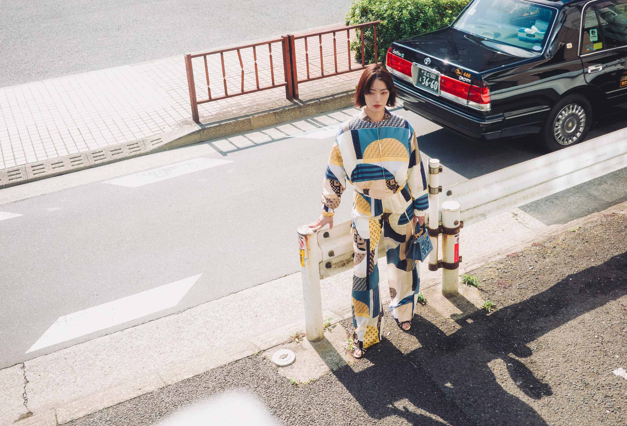 A model poses in Tokyo wearing Fendi and Manolo Blahnik