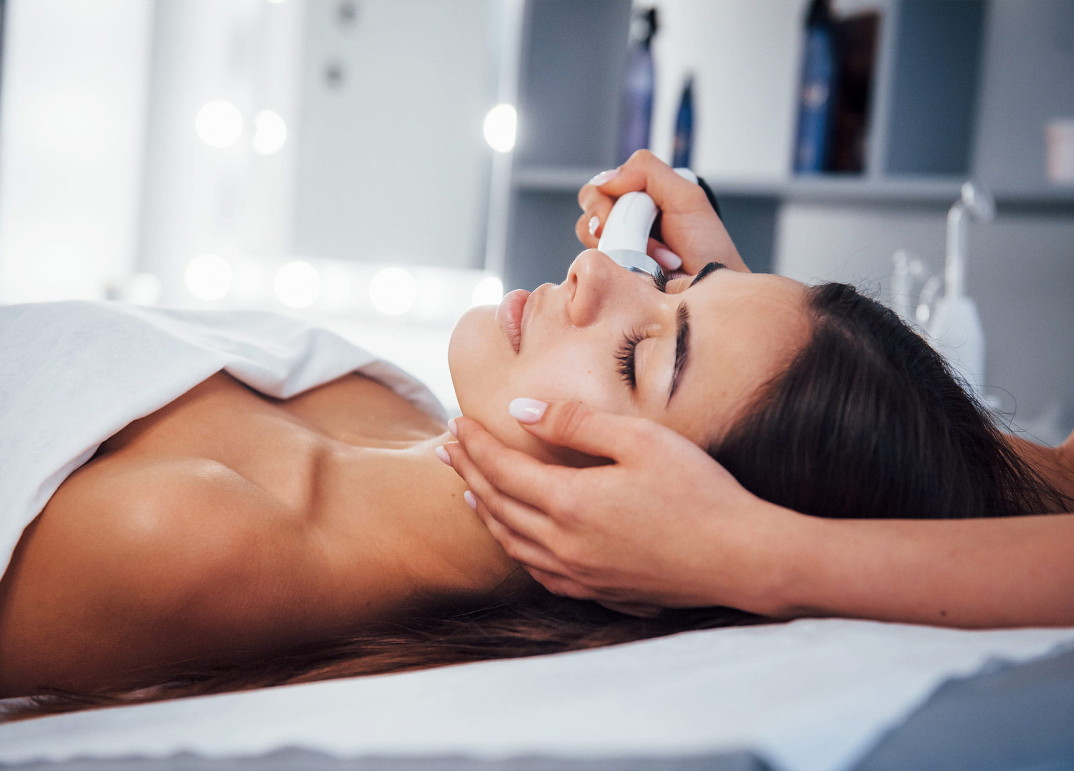 A woman receiving a radiofrequency skincare treament
