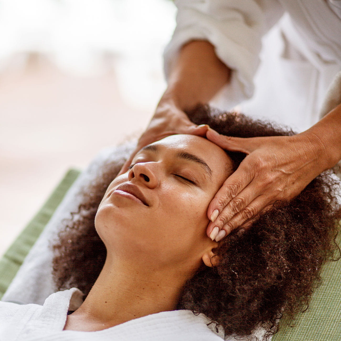 A woman receiving a spa treatment